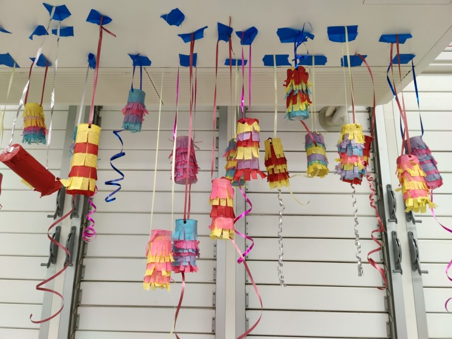 Spanish language students recycled toilet paper rolls to create miniature pinatas.