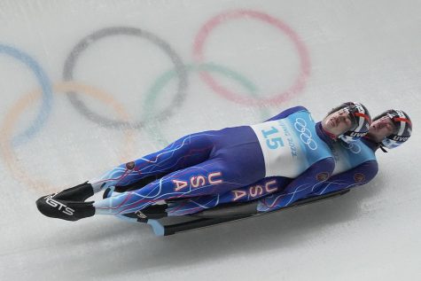 USAs Zachary Di Gregorio and Sean Hollander compete in the luge doubles event at the 2022 Bejing Olympics.