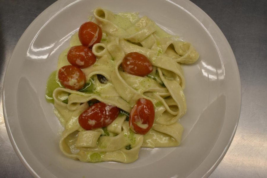 Handmade pasta with parsley cream sauce and Ho Farms (Big Island) tomatoes. The parsley came from the schools garden. 