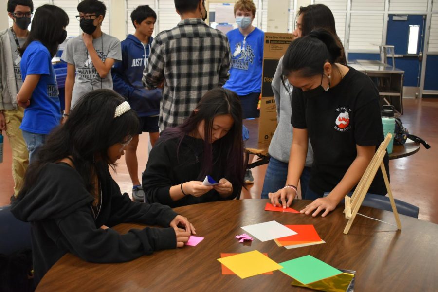Japanese language students helped the middle school students with an origami craft.