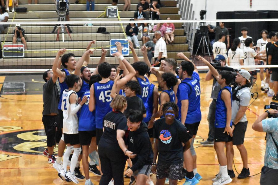 The Moanalua boys varsity volleyball team celebrates after sweeping Mililani High School in the OIA Division I championships April 26 at Radford High Schools Jim Alegre Gymnasium.  The team recorded 37 kills  and 40 assists in the three-set victory.