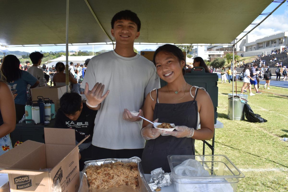 Seniors Tayton Takenishi and Riley Fukuda served up fried rice to hungry students.