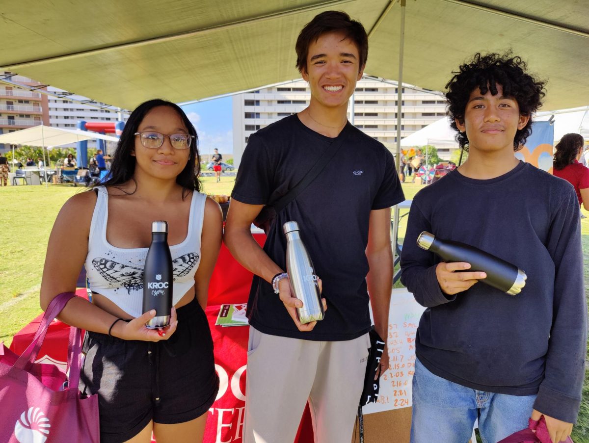 From left: senior Hope Coloma was the female winner of the flex-arm hang competition. She was able to last 1:43. Junior Sal Barbaria (center) won with a time of 2:37. Fellow junior Quincy Corpuz was just a hair behind in second with a time of 2:32.