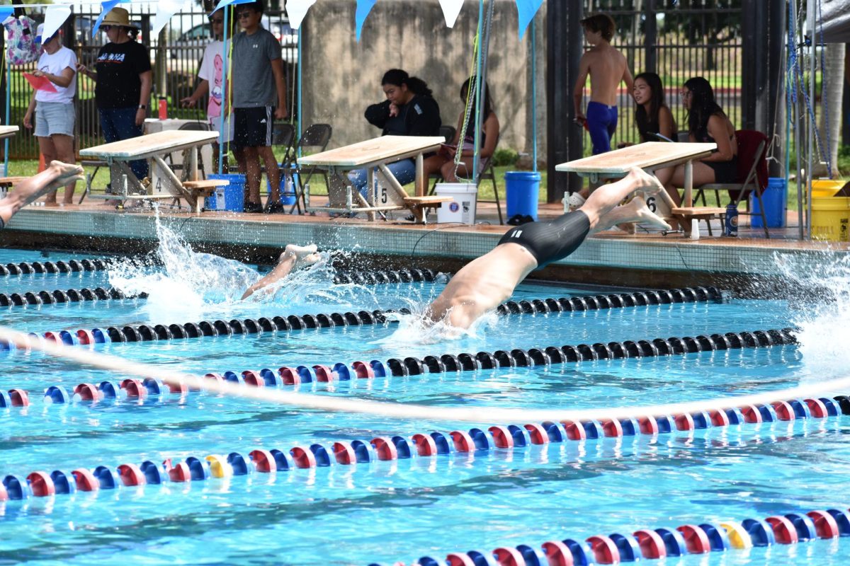 Rasti Waialeale dives in for the 50 yard freestyle.