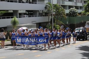 Moanalua's Cheerleaders smiled their way through the parade, with their pom poms and their chants.