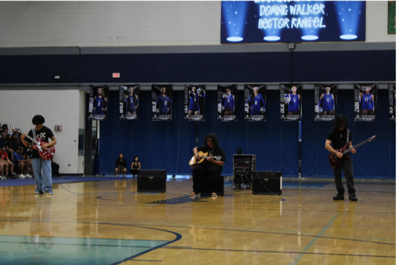 Jamarcus Hampton, Dominic Walker, and Hector Rangel play “Voice of the Soul,” by Death.