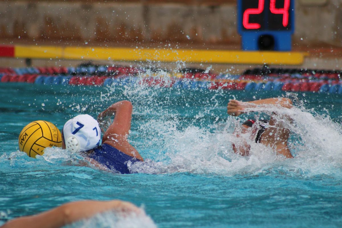 Top scorer Ellie Dallas races against the defense after gaining possession of the ball during a preseason game against Kahuku.
