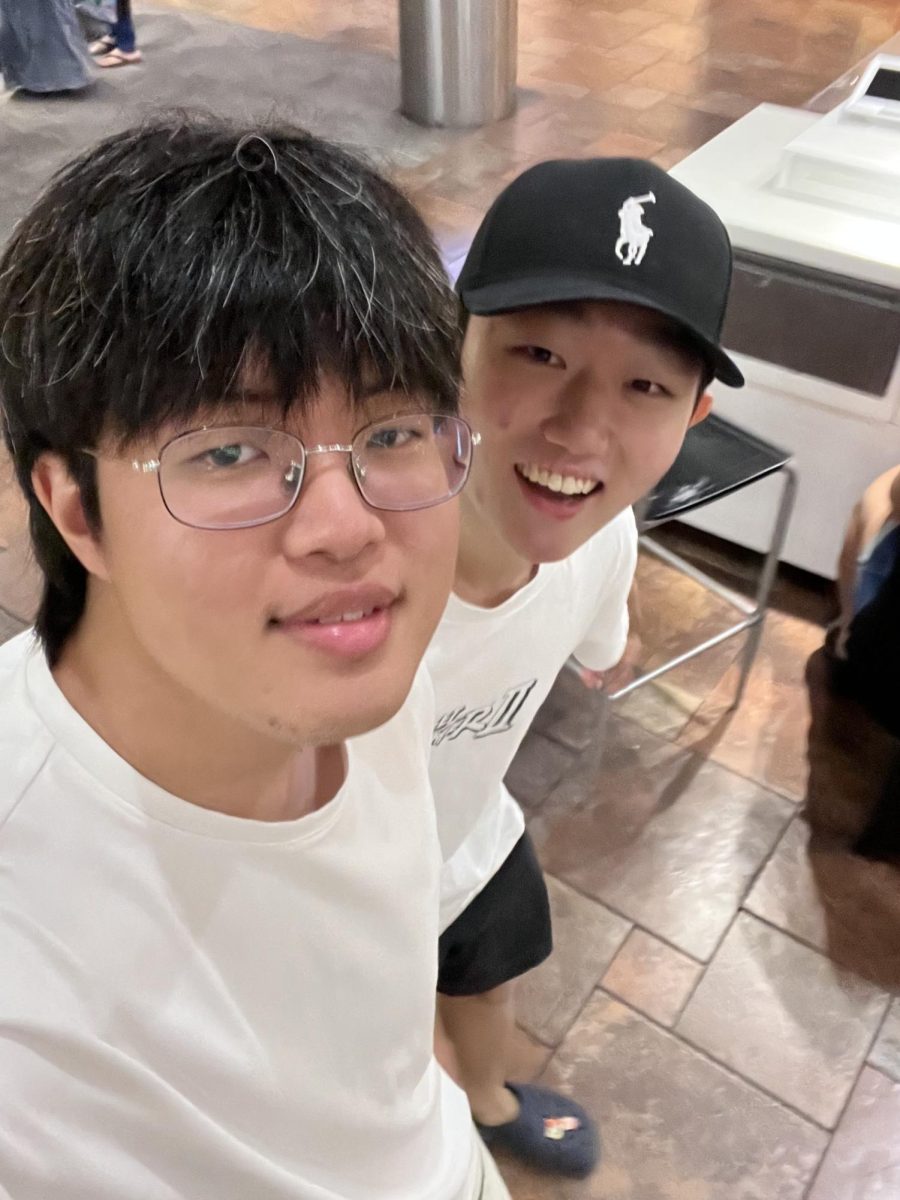 Kim and Shin walk around Pearl Ridge Mall. The duo had just met each other in person for the first time in years after last seeing each other in Korea.
