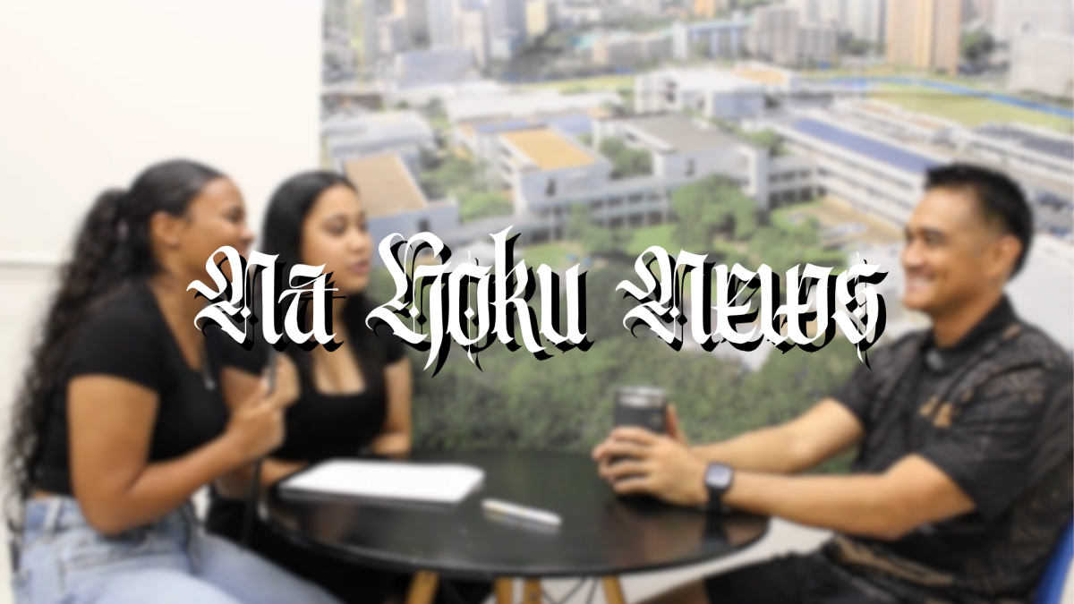 Jayla Ford and Deja Semes discuss with the graphics teacher, Sean Nishimura, about his beginnings as a teacher, and his experience with leading the graphics program throughout the years.